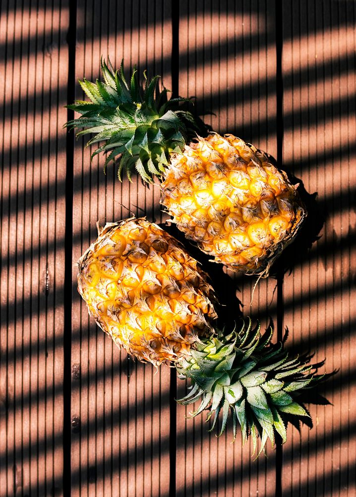 Pineapples with shadow from the light