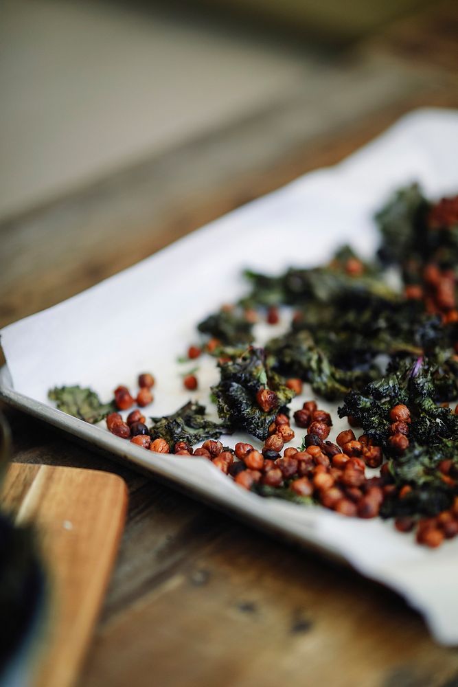 Fried kale and chickpeas on a tray