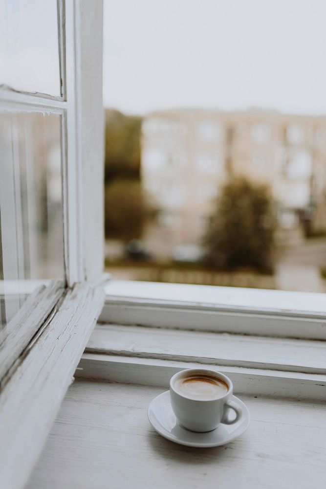 A cup of coffee by the window
