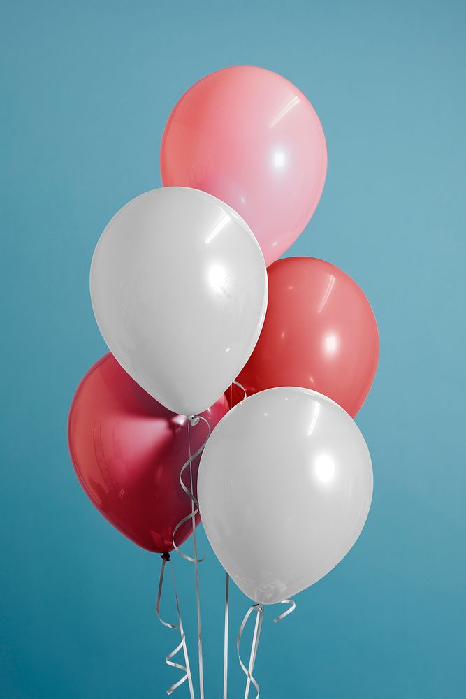 White and pastel pink balloons