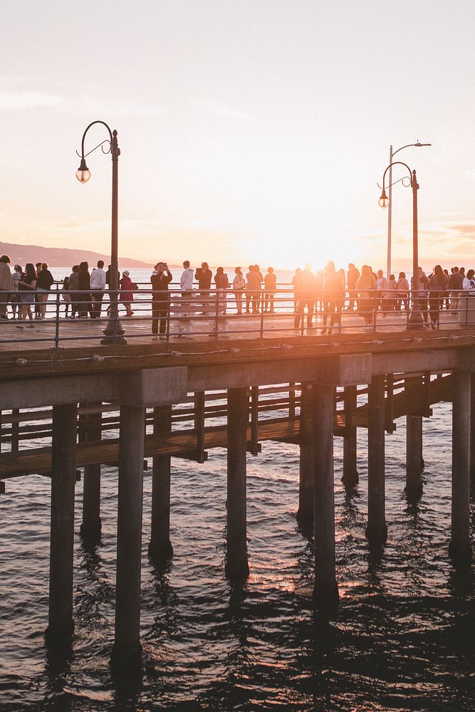 Sunset over the crowd at Santa Monica Pier, Calirfornia