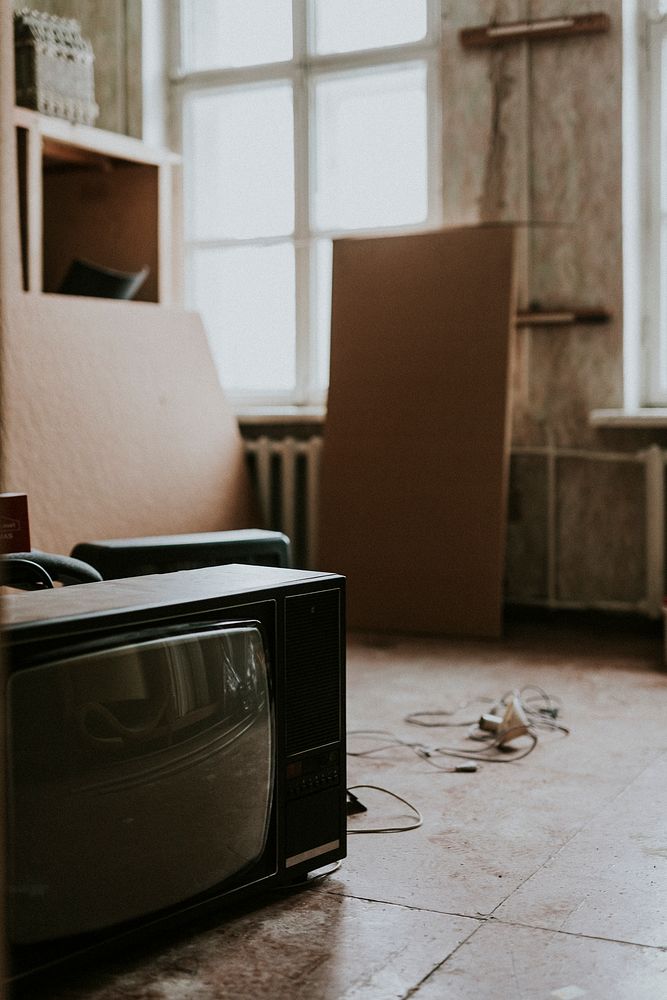 TV on the floor of an old house