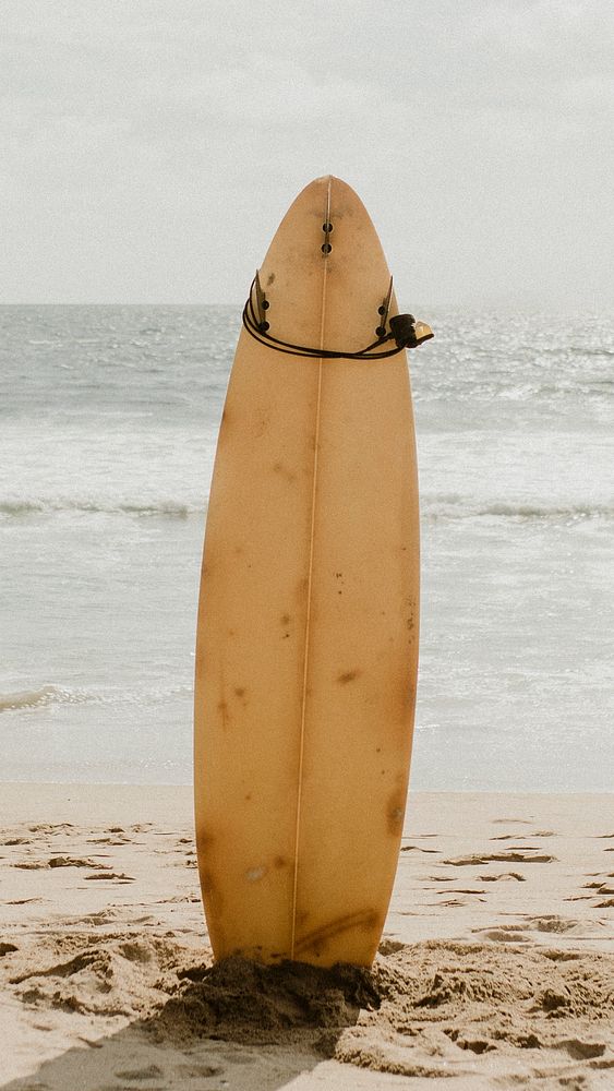 Summer iPhone wallpaper background, surfboard mockup on the beach