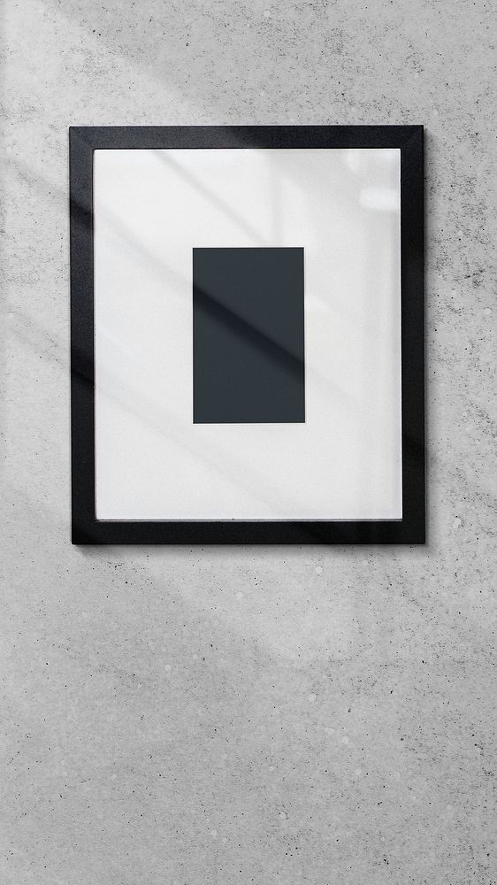 Photo frame on a wall mobile phone wallpaper
