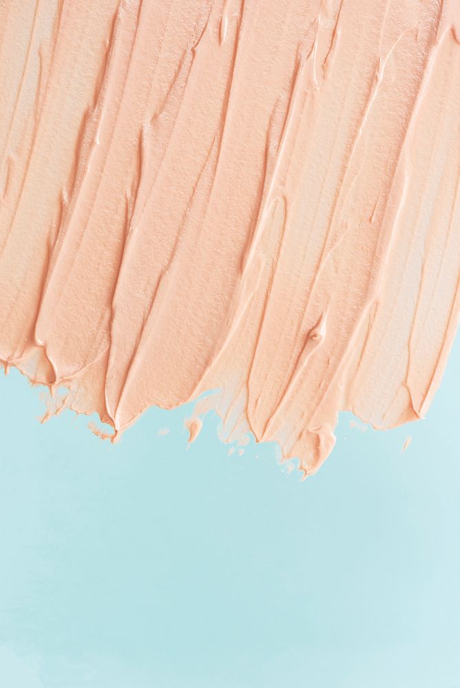 Light pink cream texture on blue background