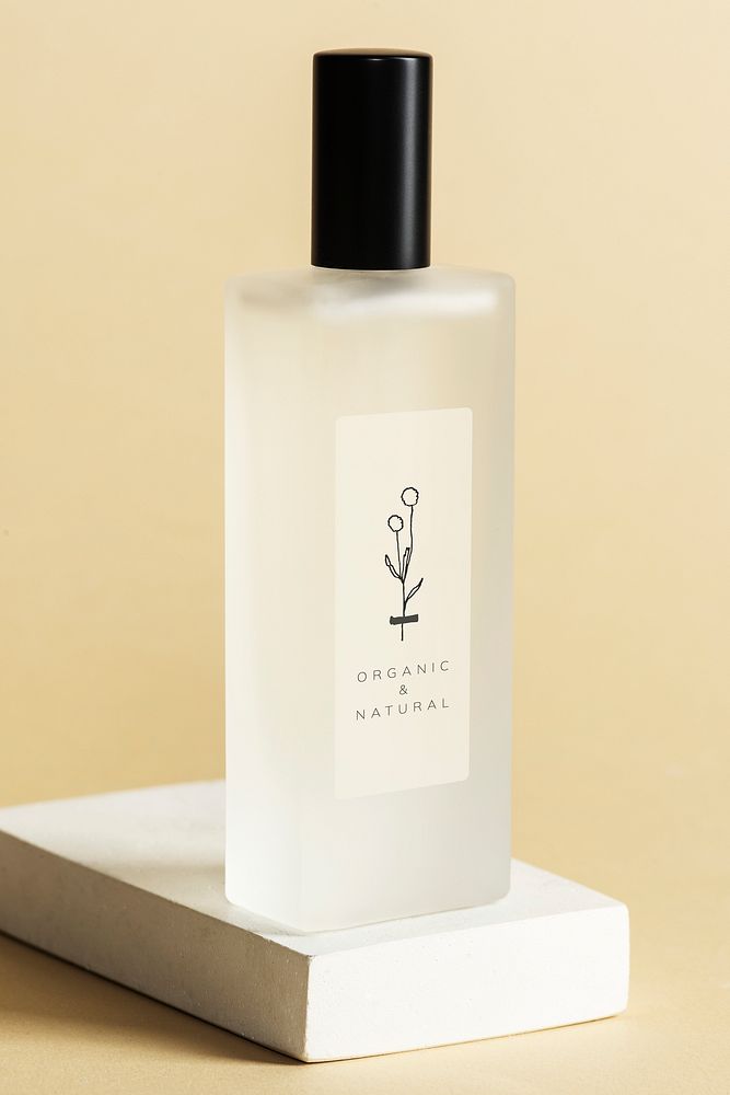 Blank perfume glass bottle on a white stone mockup