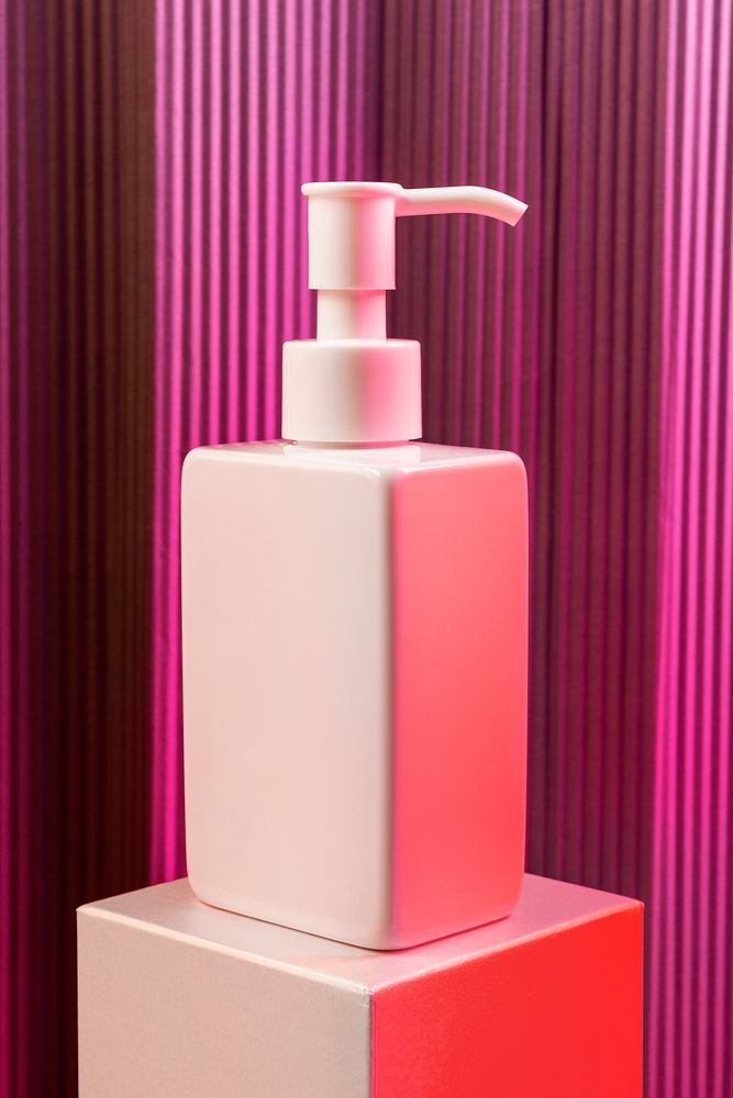 Blank white pump bottle with pink neon light mockup