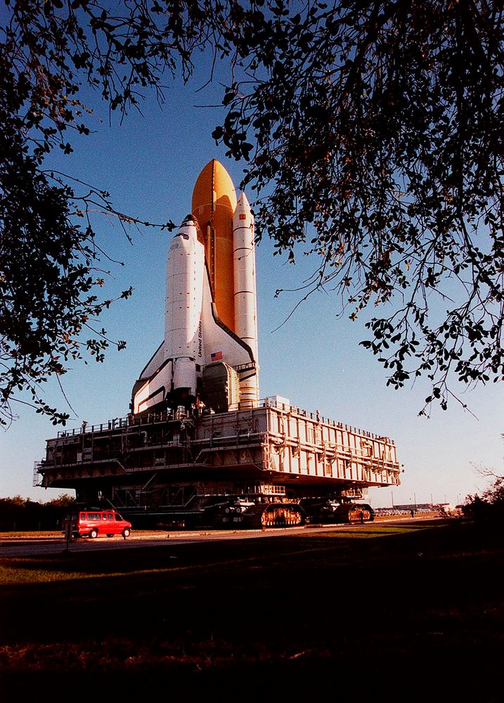 Space Shuttle Endeavour during the Shuttle's rollout to Launch Pad 39A. Original from NASA. Digitally enhanced by rawpixel.