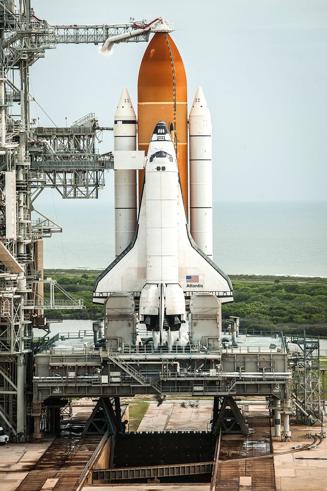 Atlantis is seen on launch pad 39a moments after the STS-135 crew arrived for their launch at the NASA Kennedy Space Center…