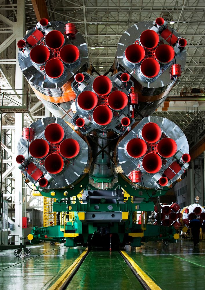 The boosters of the Soyuz rocket are seen as the Soyuz TMA-14 spacecraft and boosters are assembled Monday, March 23, 2009…