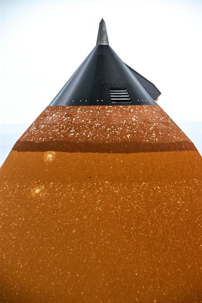 The External Tank attached to Space Shuttle Atlantis shows Hail. Original from NASA. Digitally enhanced by rawpixel.