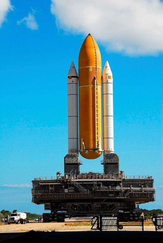 Space shuttle Atlantis external fuel tank-solid rocket booster stack, atop a mobile launcher platform. Original from NASA.…