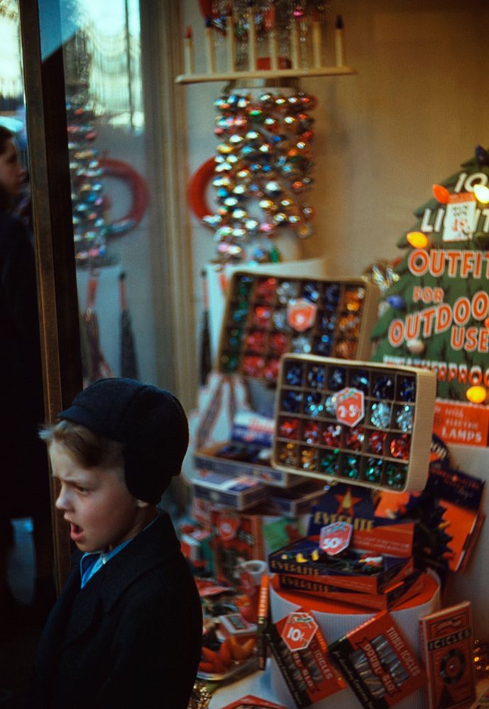 Boy beside Store Window Display of Christmas Ornaments. Original from Library of Congress. Digitally enhanced by rawpixel.