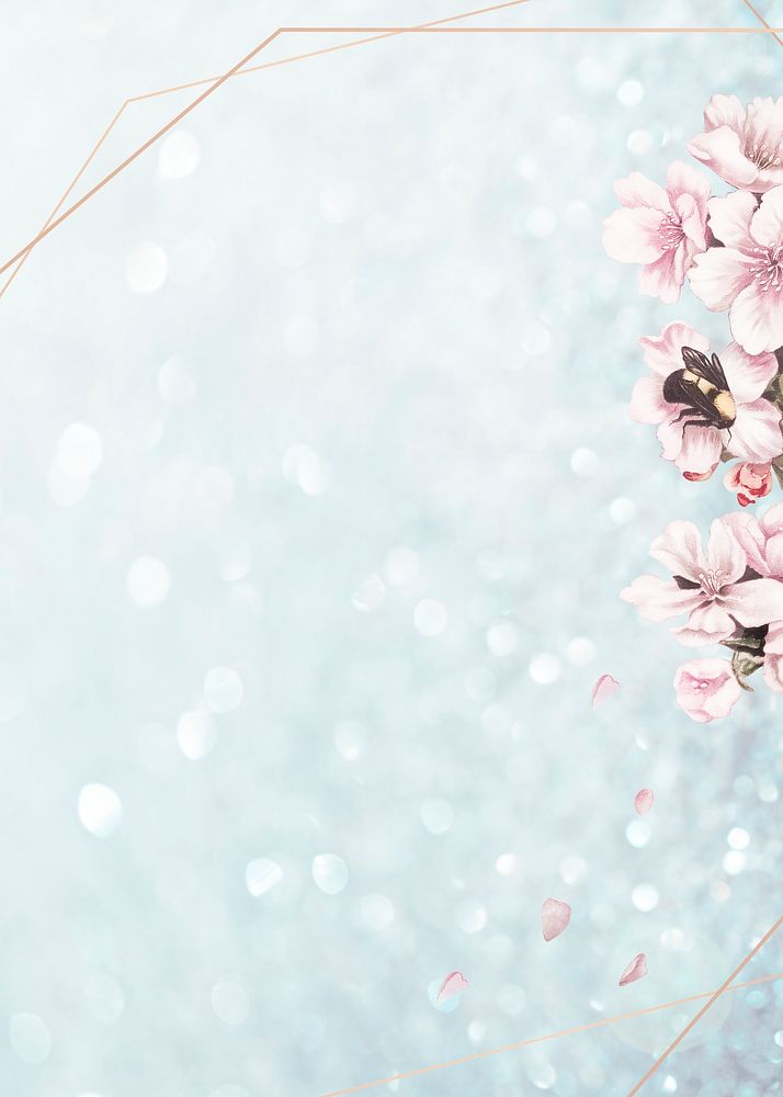 Pink cherry blossom flower bouquet border frame on glitter blue background