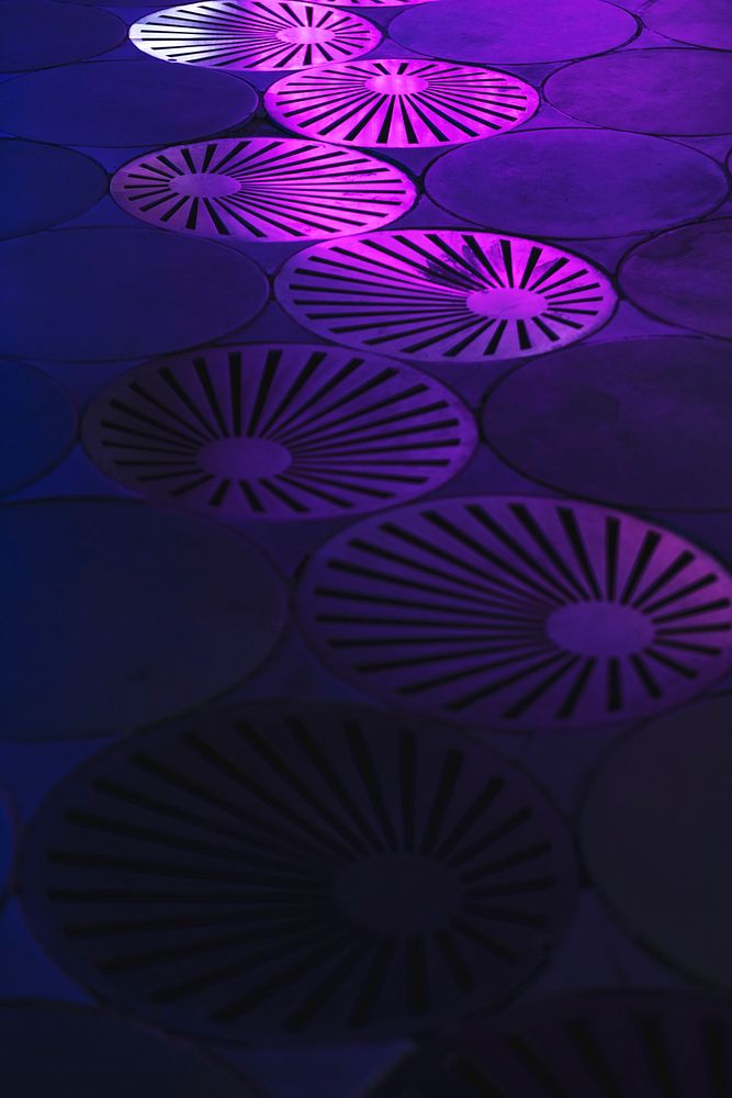 Dark neon pink geometrical patterned tiles background