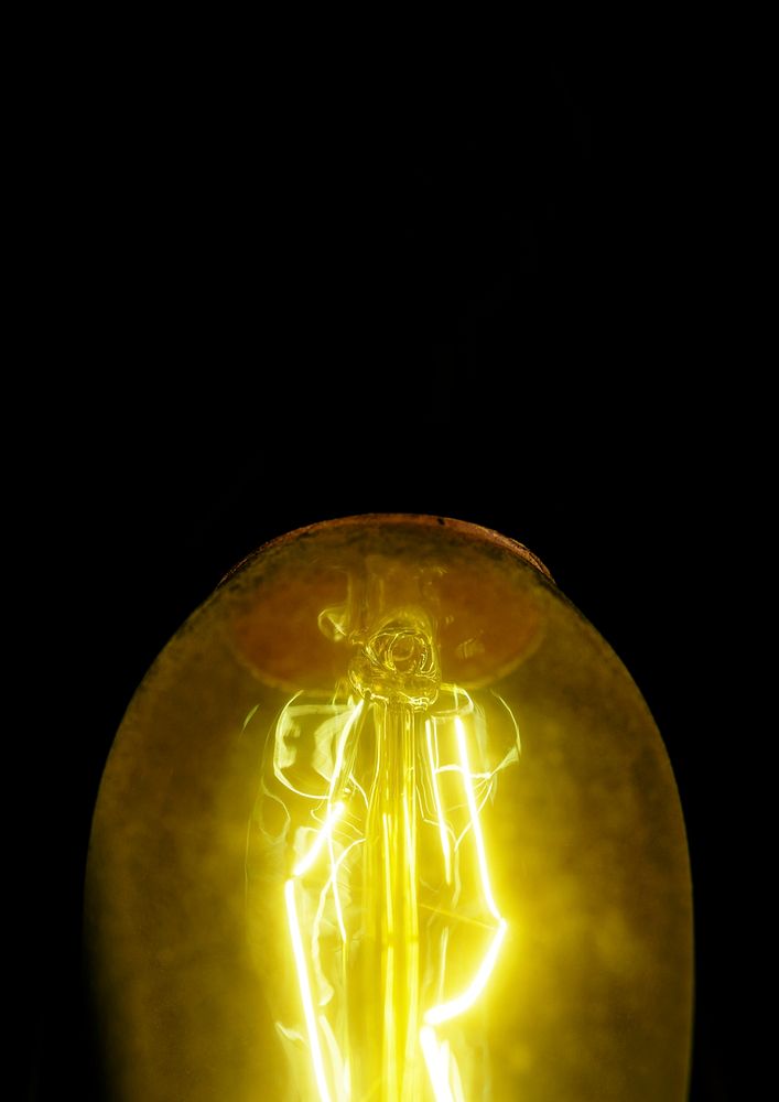Close up of a retro yellow light bulb background