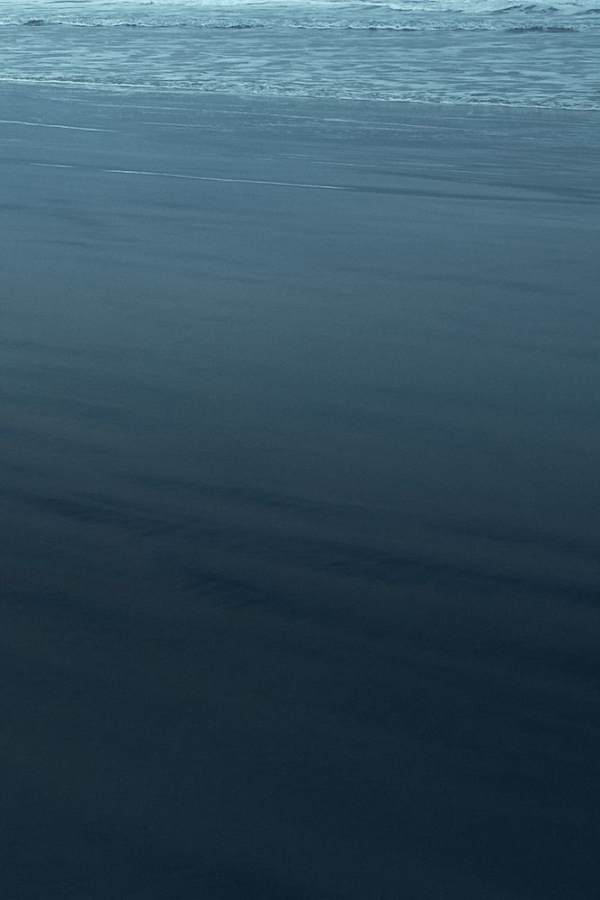 Black beach in the evening background