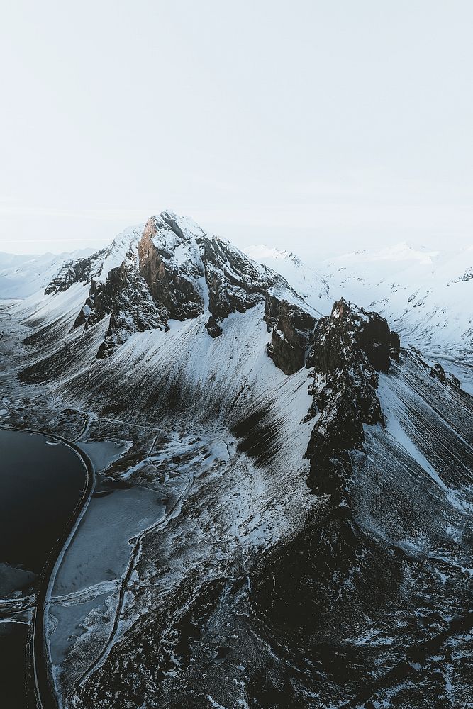 Drone view of a snow covered Eystrahorn mountain in Iceland