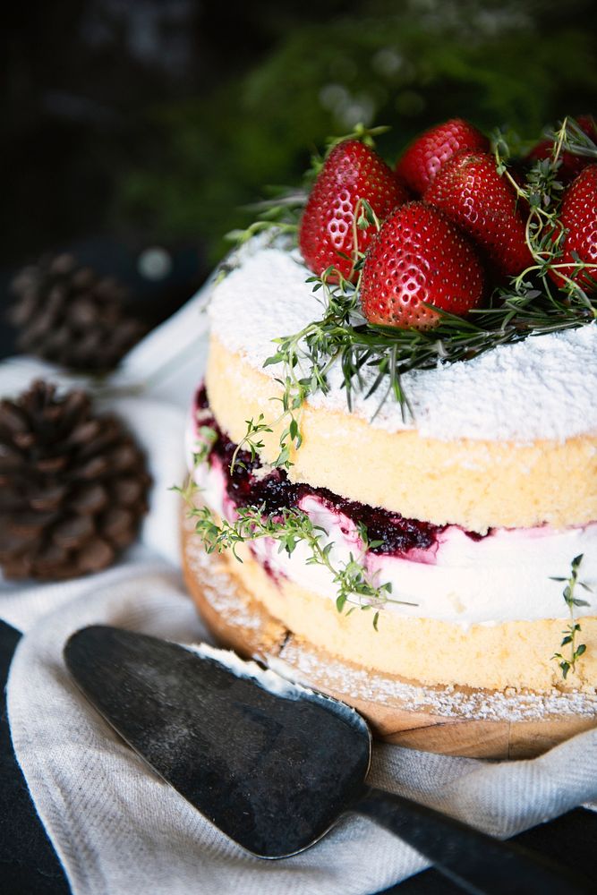 Layered cake with fresh cream and strawberries