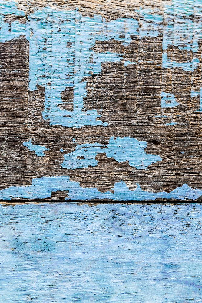 Peeled blue paint wood texture 