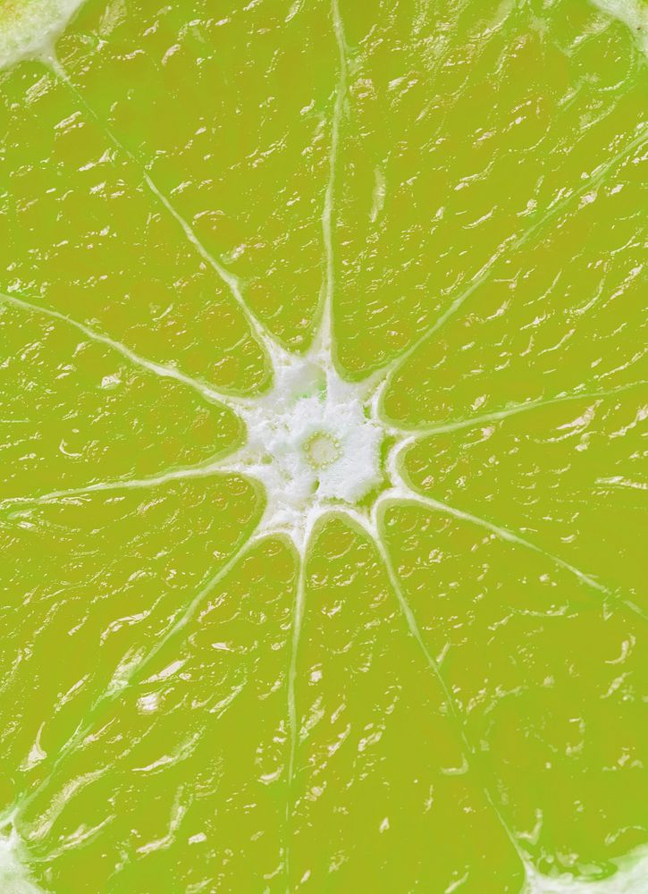 Closeup of green citrus lime textured background
