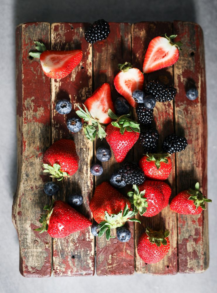 Fresh berries on a wooden board