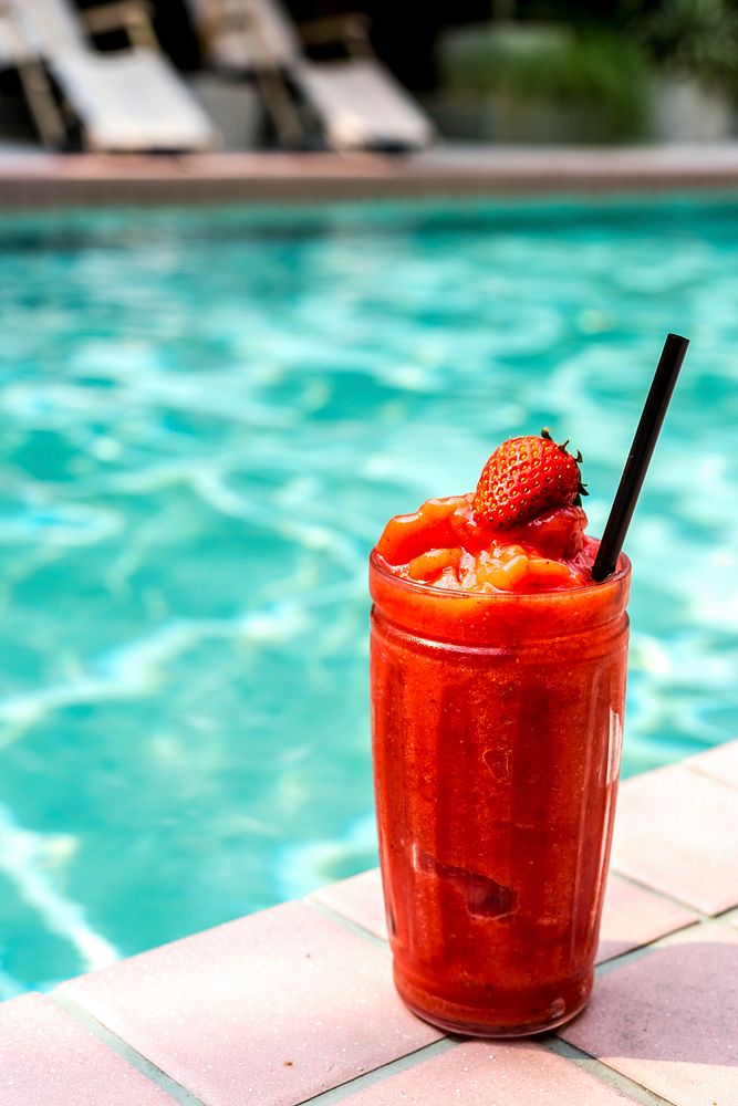 Strawberry smoothie by the swimming pool