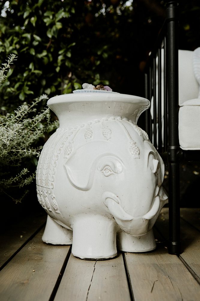 Cute white elephant tablet on the patio