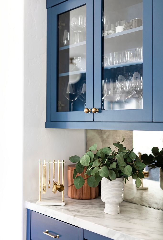 Blue cabinets design with white wall