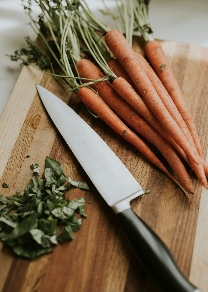 Fresh organic carrots on a cutting board