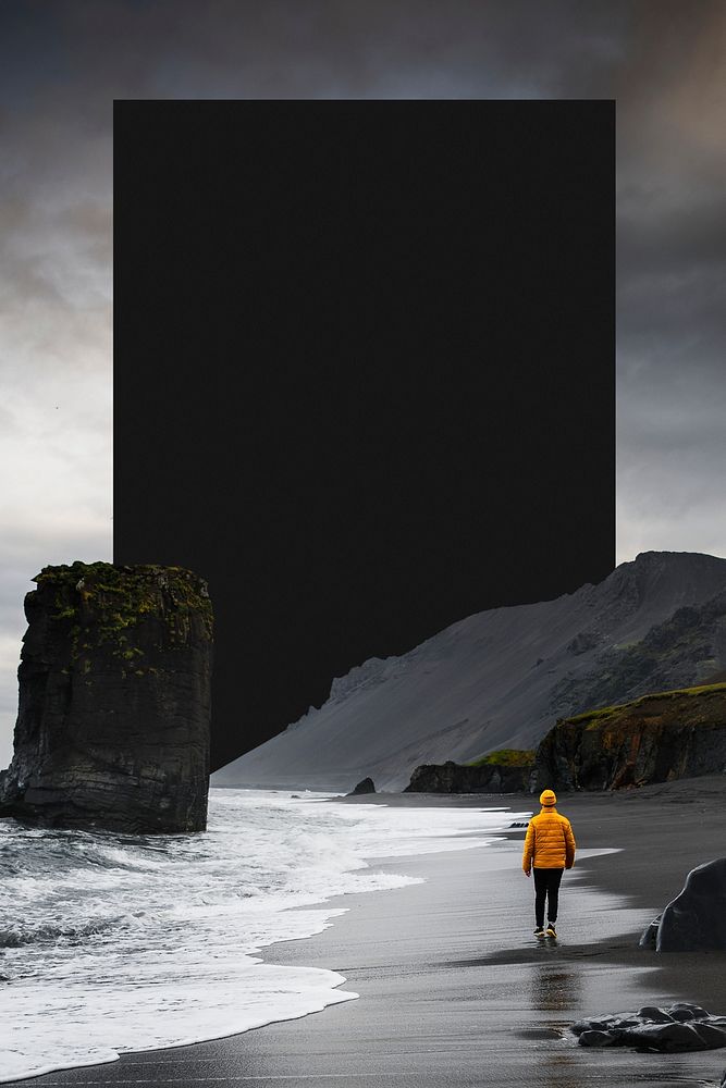 Man walking along a black beach in Iceland template