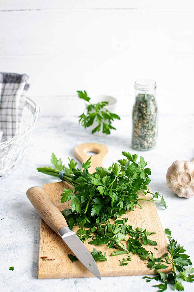 Fresh organic parsley on a wooden cutting board
