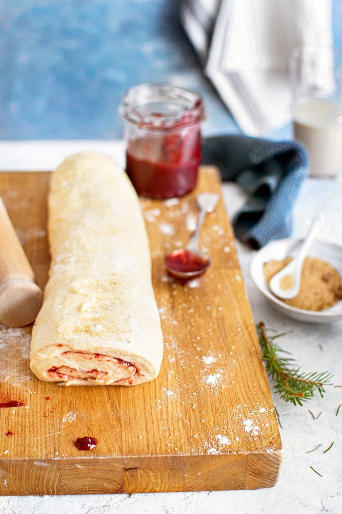 Fresh dough filled with cherry jam