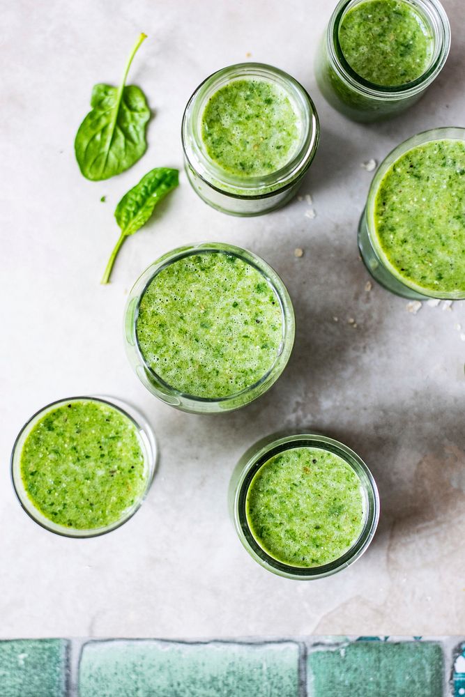 Fresh green smoothie in glasses