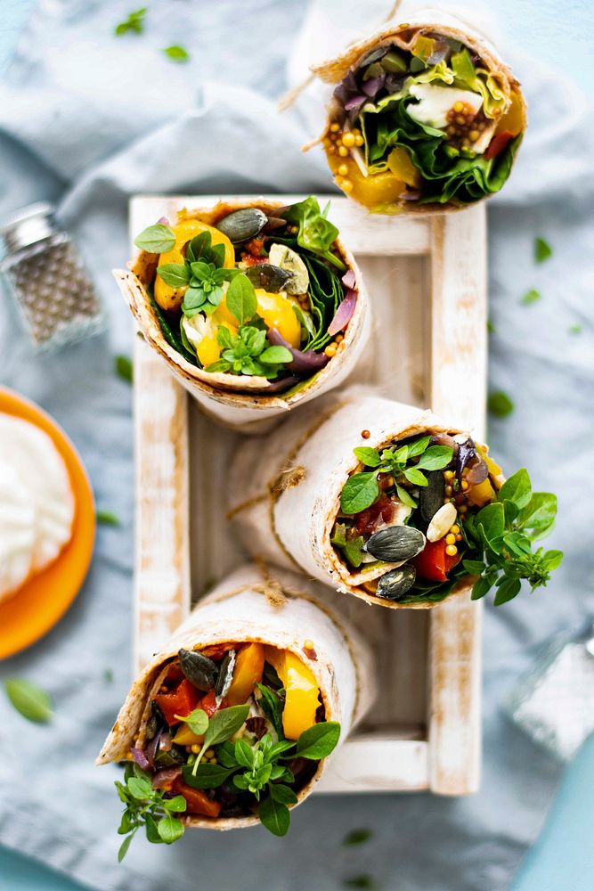 Tortilla wraps with roasted vegetables and mozzarella cheese food photography