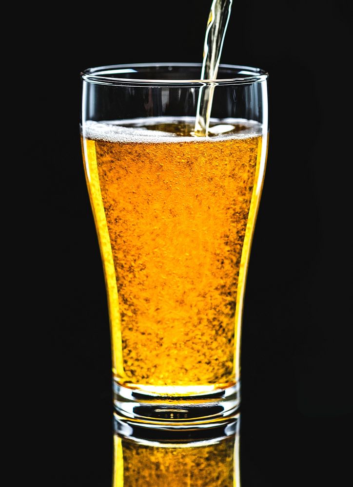 A glass of cold beer macro photography