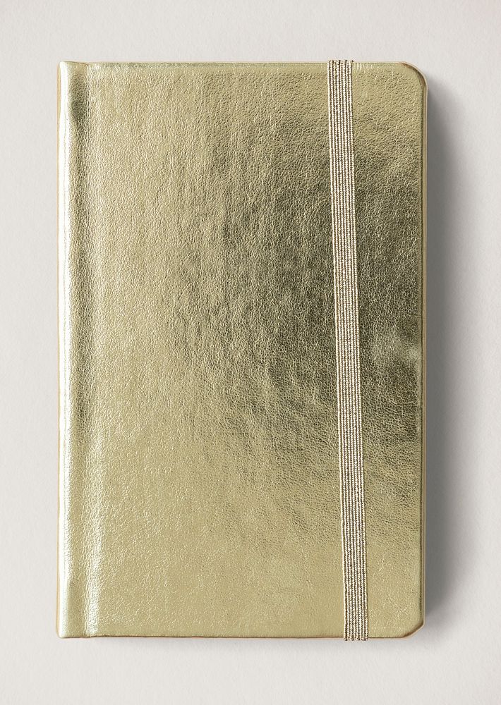 Blank shiny golden notebook mockup