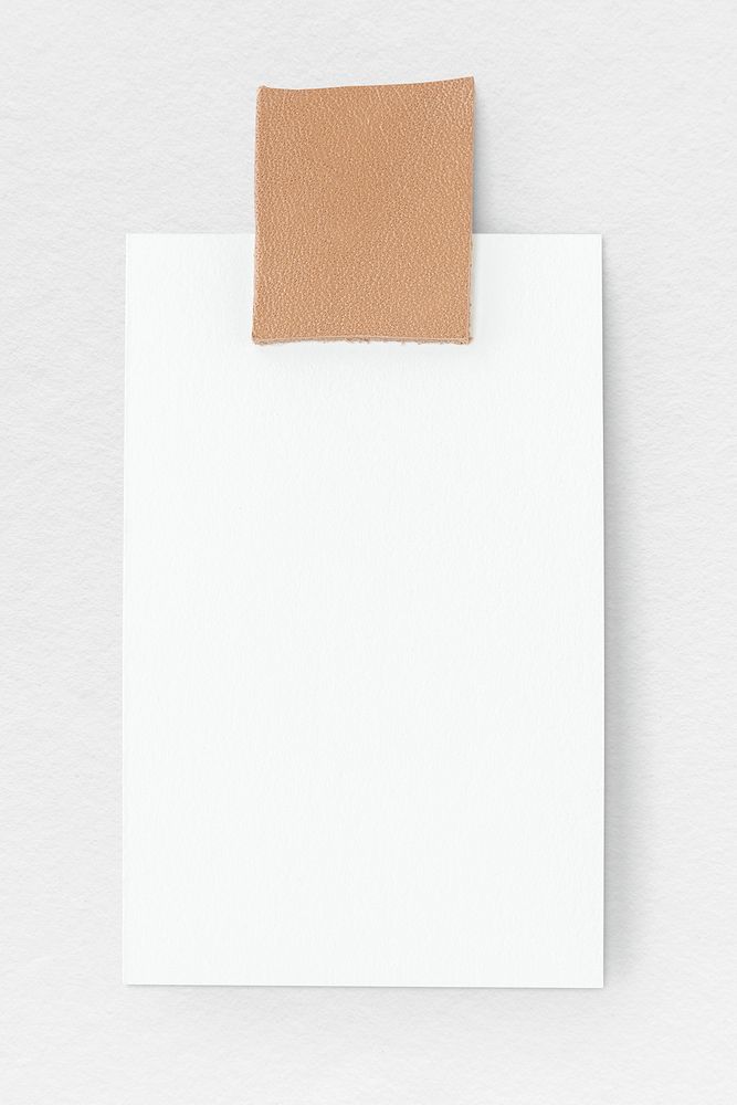 White blank paper stuck to the wall