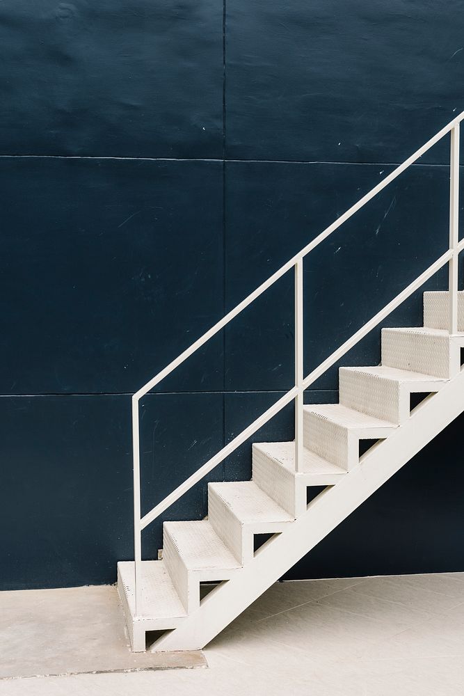 White staircase in a blue building