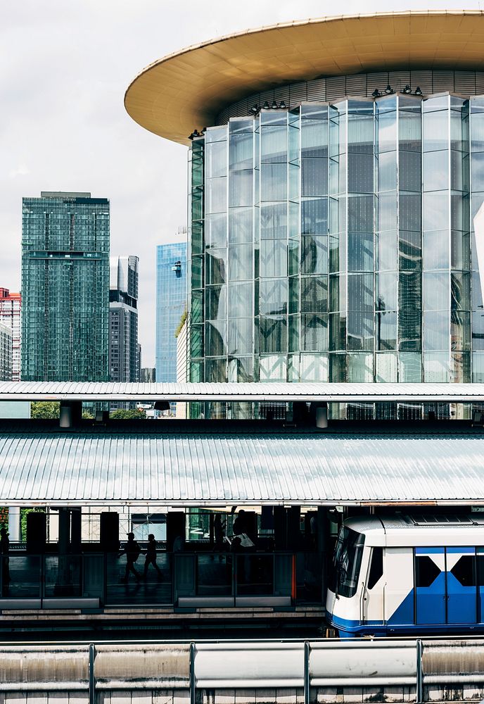 View of skytrain station and a glass building in downtown