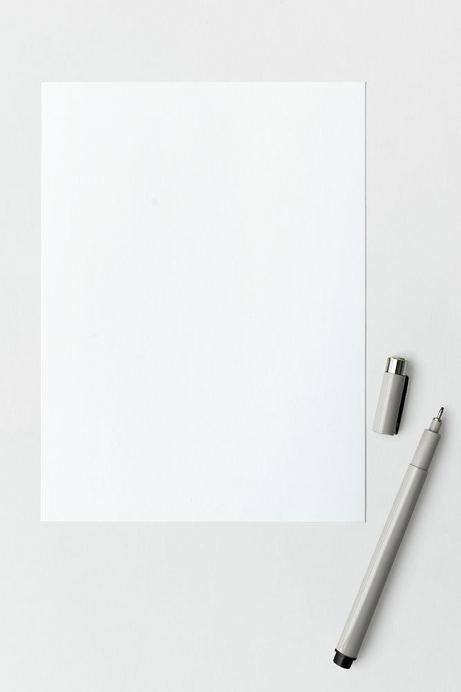 Blank white paper with black pen