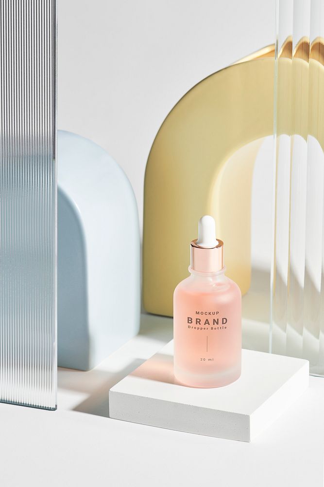 Dropper bottle mockup psd with patterned glass texture product backdrop