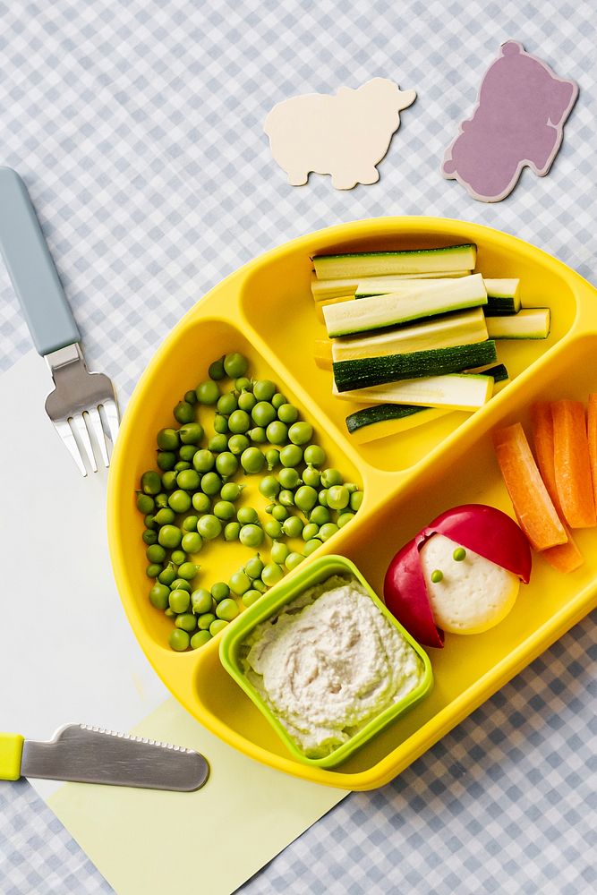 Kids healthy finger foods on yellow plate