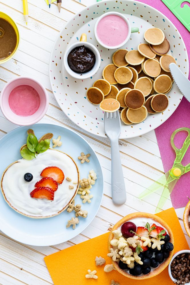 Pancake party, kids food with fresh berries and yogurt
