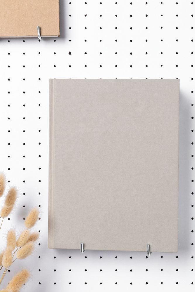 White hardcover book, publication with blank design space