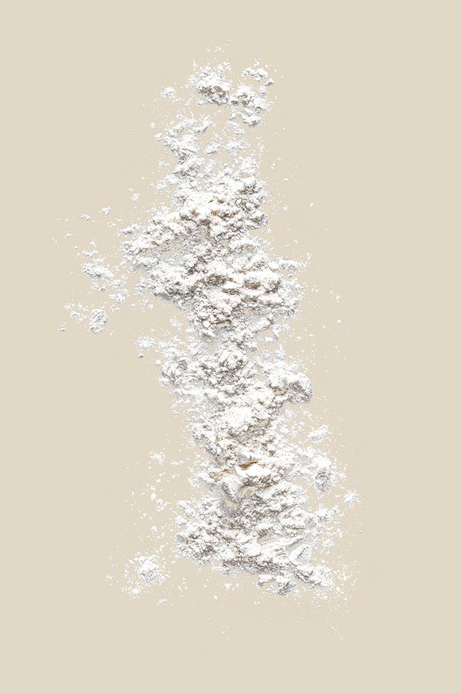 White flour texture, beige background