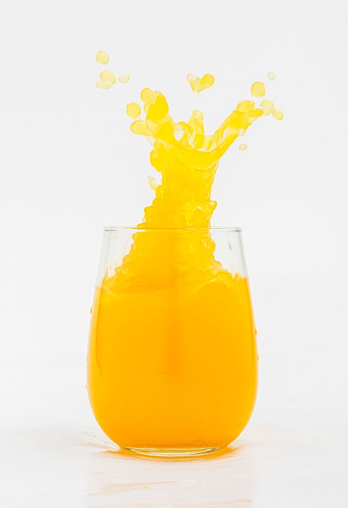 Spilling out of fresh orange juice