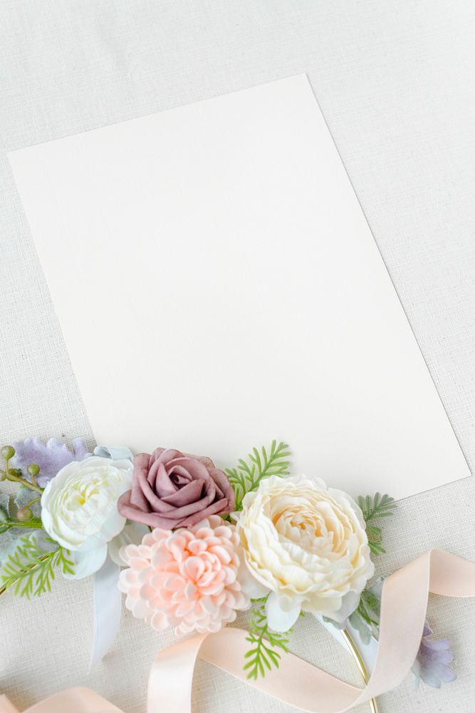 White blank invitation card with flowers