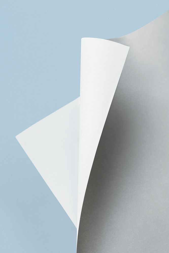 Gray and white rolled paper mockup on a blue background