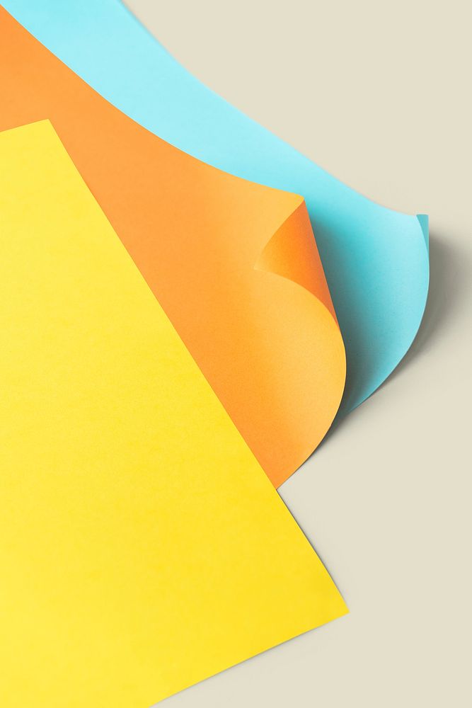 Colorful curled paper mockup on a gray background